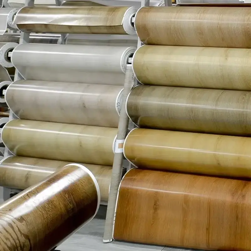 WPC ଚଟାଣରେ ଲାମିନେଟ୍ ପାଇଁ PVC ରଙ୍ଗ ସାଜସଜ୍ଜା ଚଳଚ୍ଚିତ୍ର: ସେମାନେ ତୁମର ଚଟାଣ ପାଇଁ ଖେଳ ପରିବର୍ତ୍ତନକାରୀ କାହିଁକି?